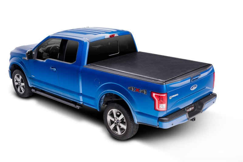 Truxedo 05-15 Nissan Navara w/Rack 4ft 10in Lo Pro International Bed Cover