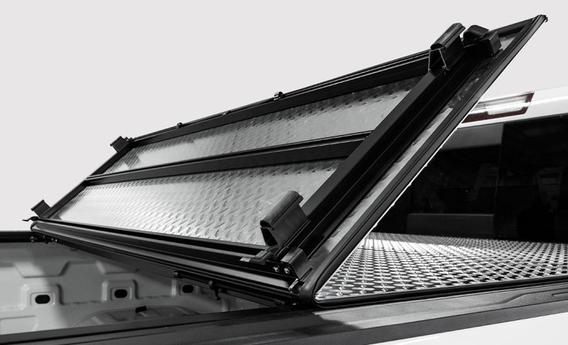 Access LOMAX 2022+ Rivian R1T 4ft 6in Bed (w/ OEM Tonneau Track) Folding Hard Cover - Carbon Fiber
