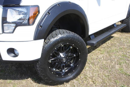 Lund 15-17 GMC Sierra 2500 RX-Rivet Style Smooth Elite Series Fender Flares - Black (4 Pc.)