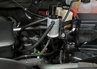 J&amp;L 20-26 Chevy Silverado/GMC Sierra 2500/3500 6.6L Drivers Side Oil Separator 3.0 - Clear Anodi