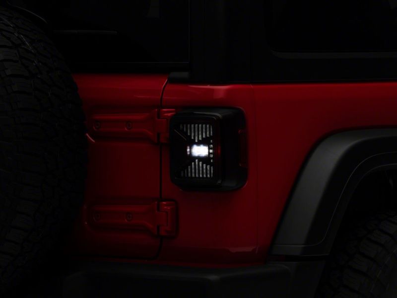 Raxiom 18-23 Jeep Wrangler JL LED Tail Lights- Blk Housing (Smoked Lens)