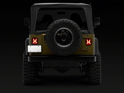 Raxiom 76-06 Jeep CJ7 Wrangler YJ & TJ Gladiator LED Tail Lights- Black Housing (Smoked Lens)