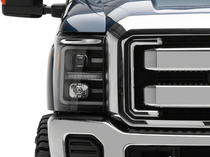 Raxiom 11-16 Ford F-250 Super Duty LED Projector Headlights - Blk Housing (Clear Lens)